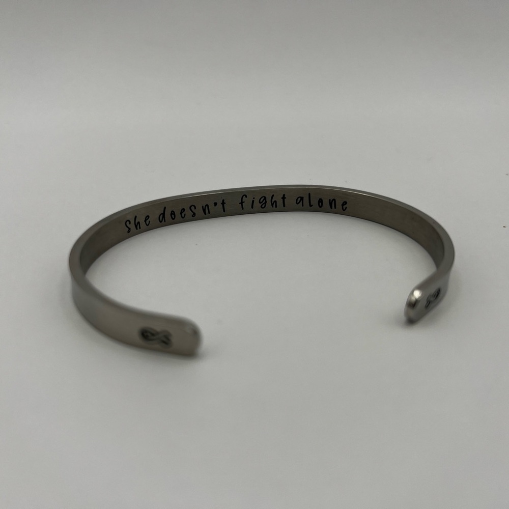 Cancer Awareness SHE DOESN’T FIGHT ALONE Etched Metal Cuff Bracelet